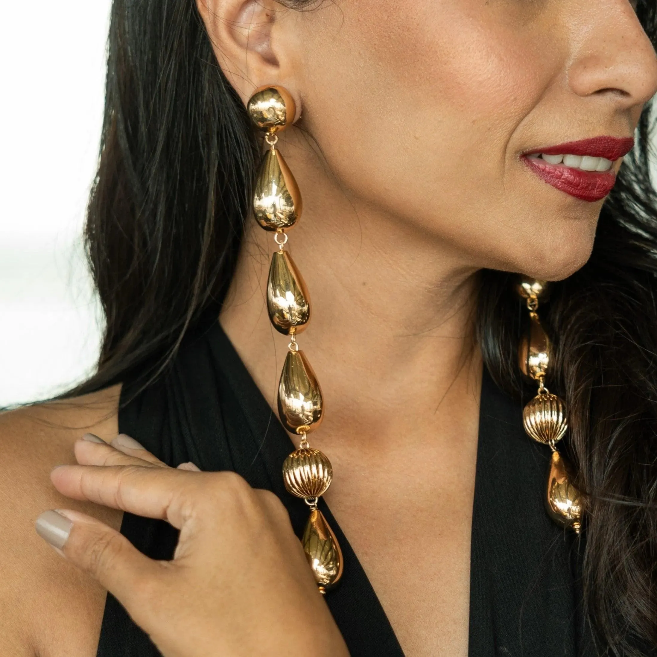TFC Deepika Drop Bead Vortex Gold Plated Shoulder Duster Dangler Earrings
